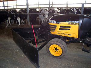 V-Plow on a compact tractor